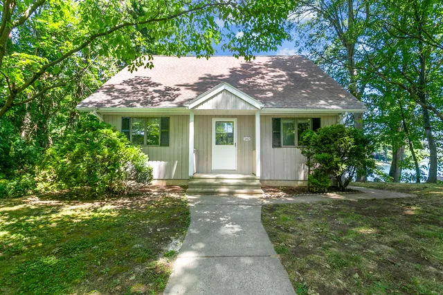 a view of a house with a garden