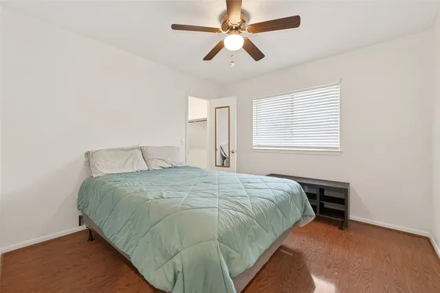 a view of walk in closet with empty room