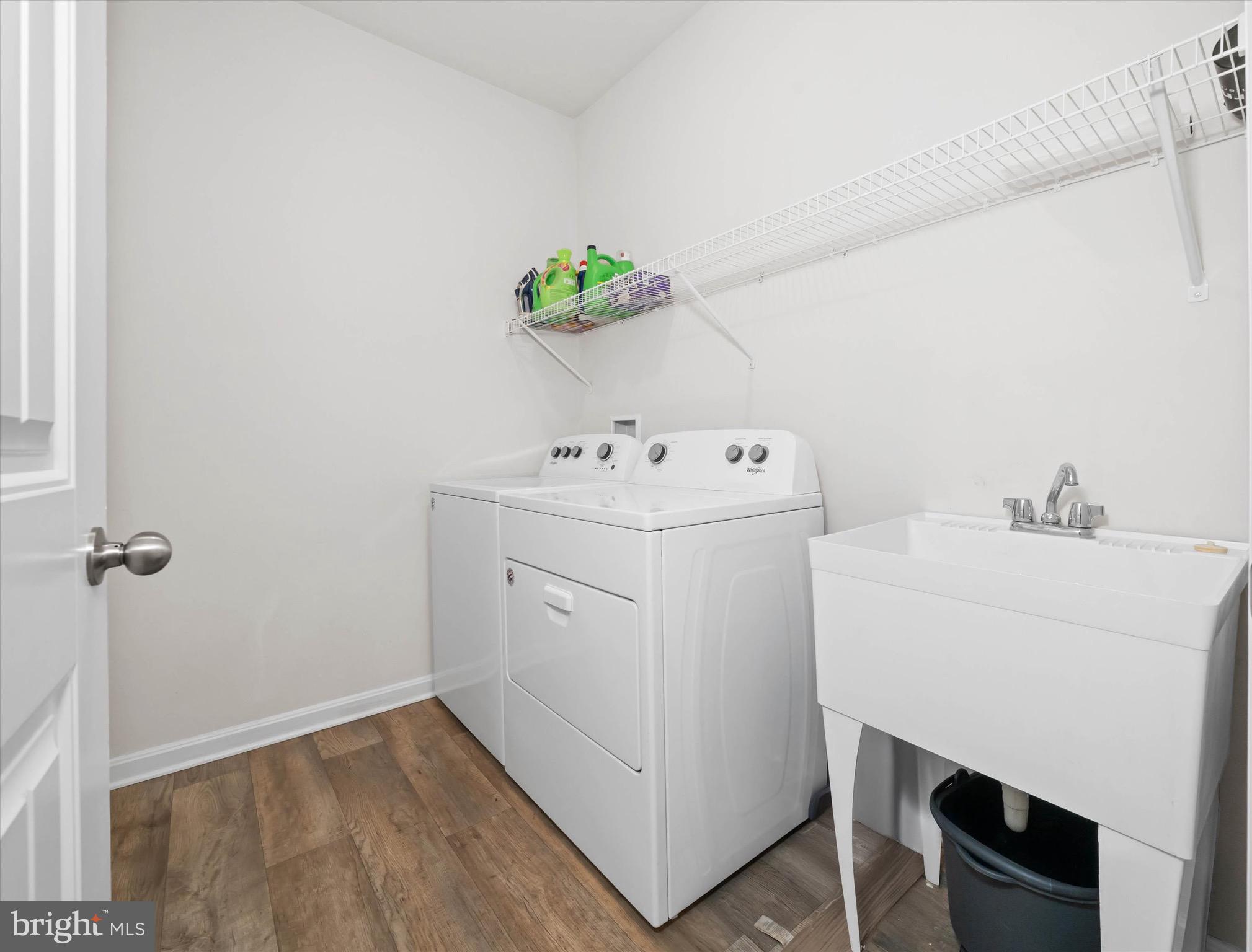 735 Red Maple Road Smyrna, DE 19977 - Photo 32 of 42 a utility room with dryer and washer