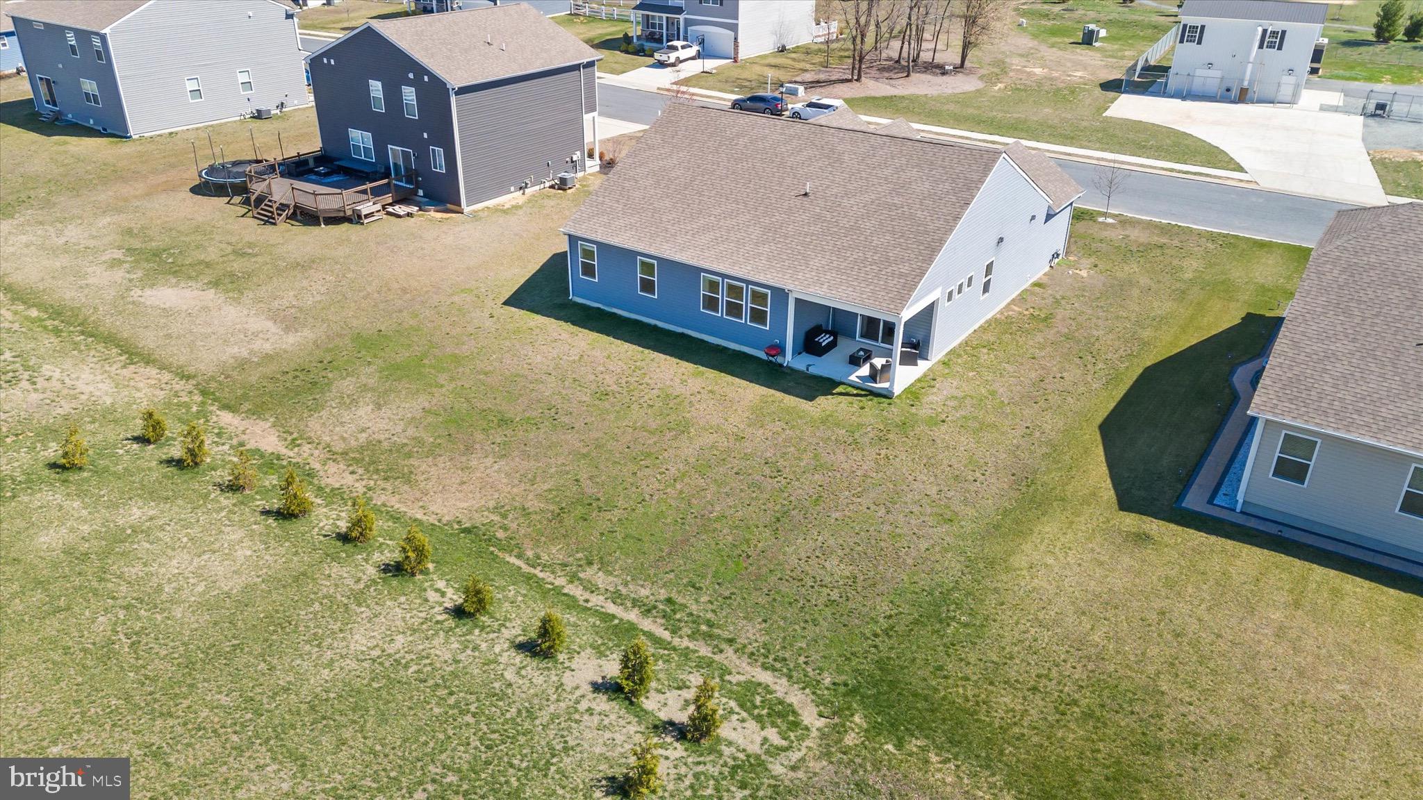 735 Red Maple Road Smyrna, DE 19977 - Photo 35 of 42 a living room with a couch