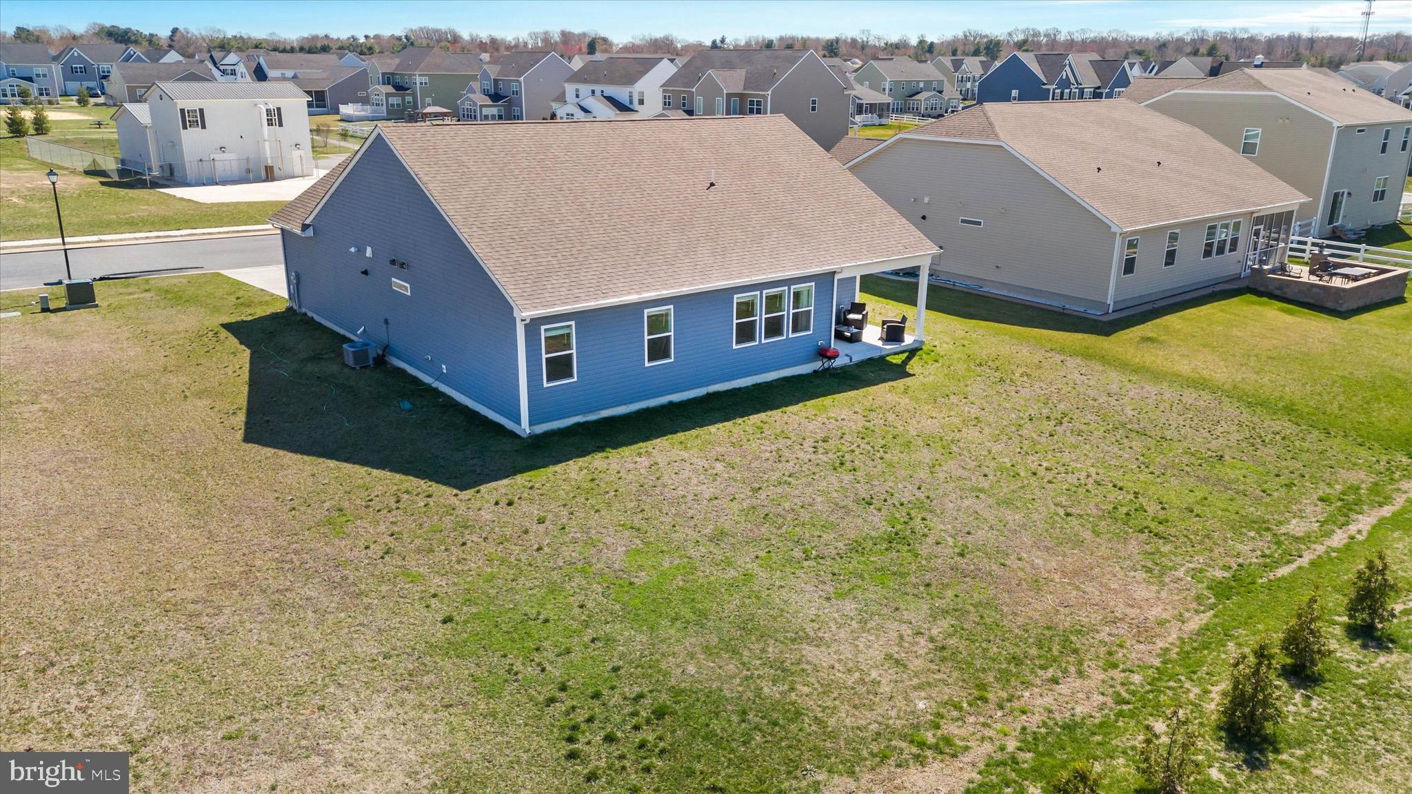 735 Red Maple Road Smyrna, DE 19977 - Photo 36 of 42 an aerial view of residential houses with outdoor space