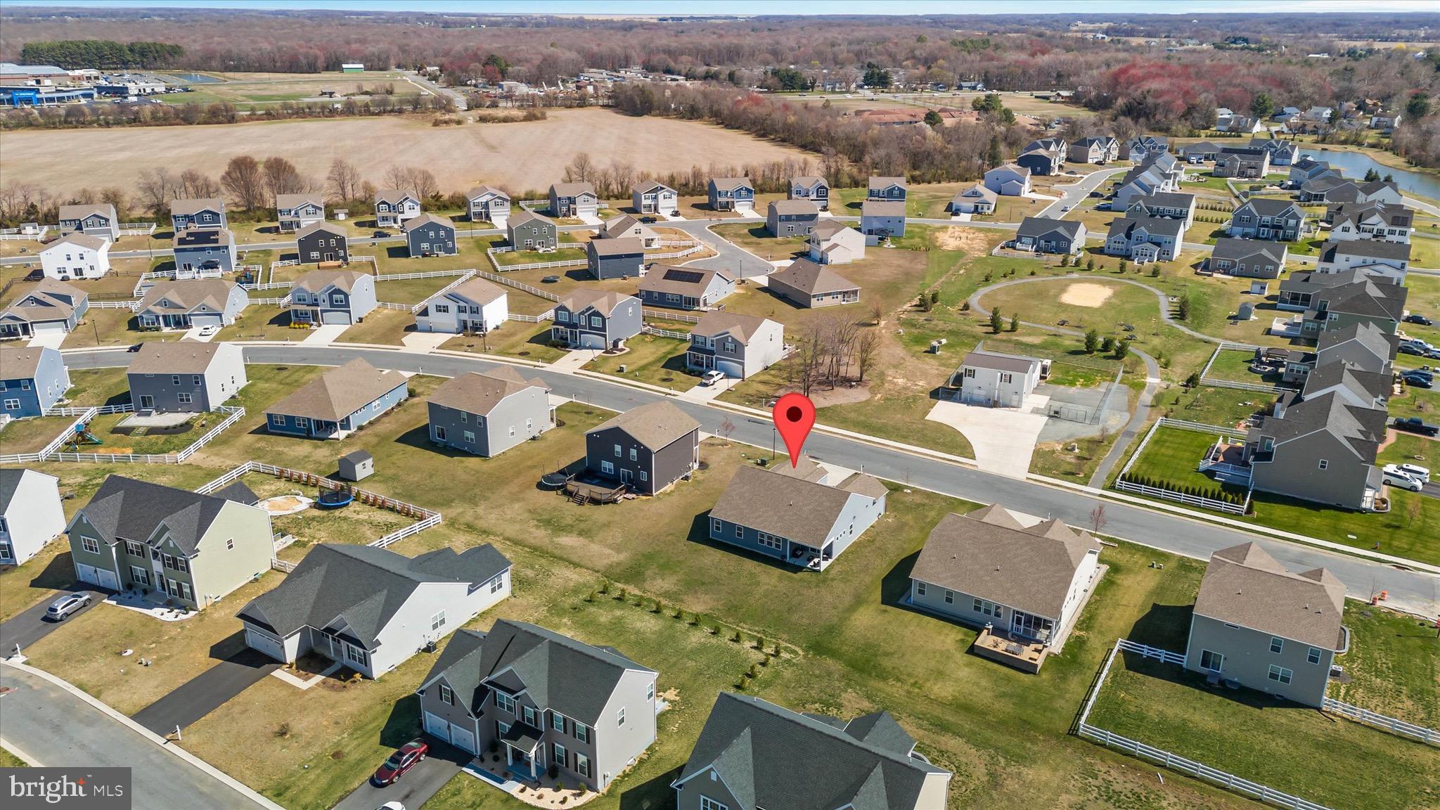 735 Red Maple Road Smyrna, DE 19977 - Photo 40 of 42 an aerial view of a houses with a lake view