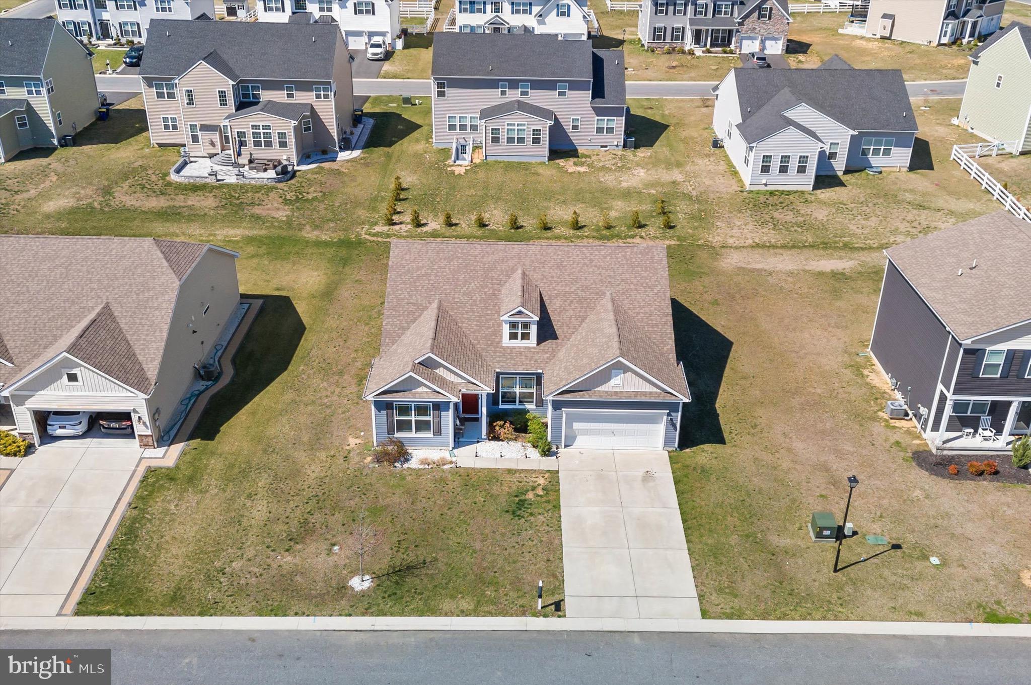735 Red Maple Road Smyrna, DE 19977 - Photo 5 of 42 an aerial view of a house with swimming pool