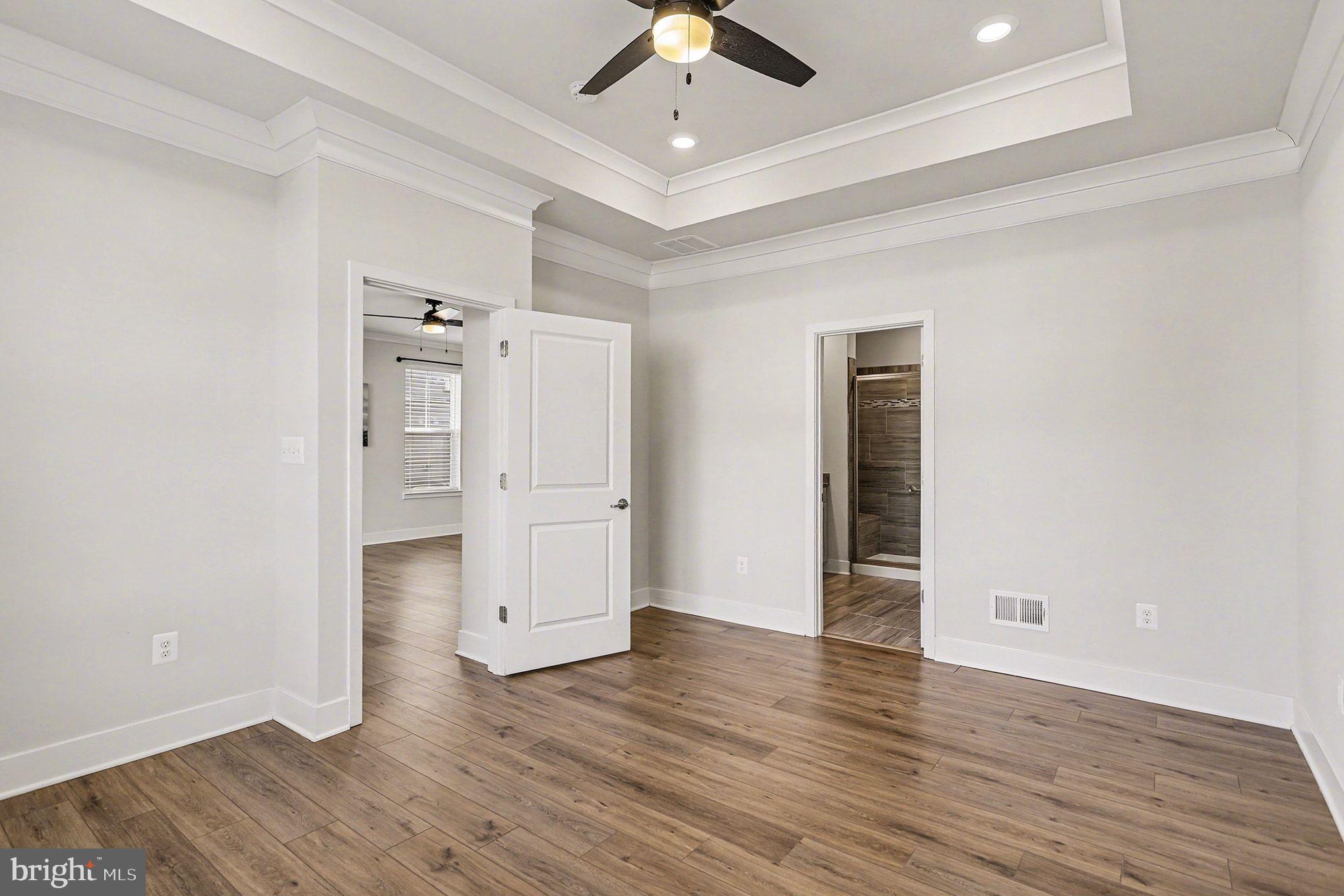 63 Rustic Wood Drive Gettysburg, PA 17325 - Photo 16 of 49 an empty room with wooden floor closet and windows
