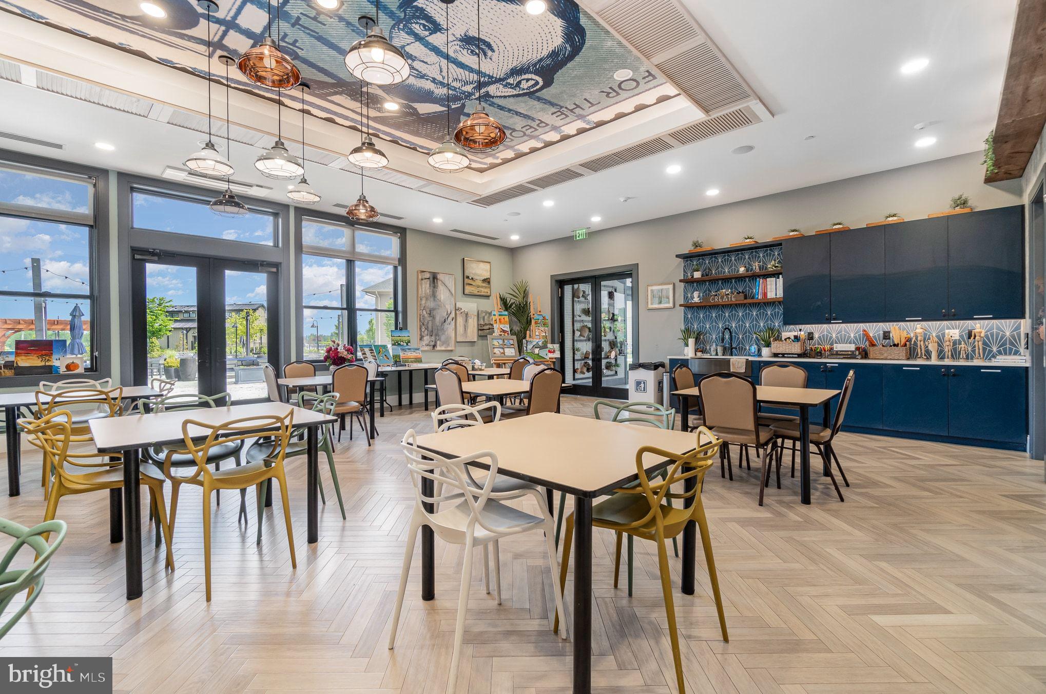 63 Rustic Wood Drive Gettysburg, PA 17325 - Photo 37 of 49 a view of a dining hall with furniture and a kitchen view