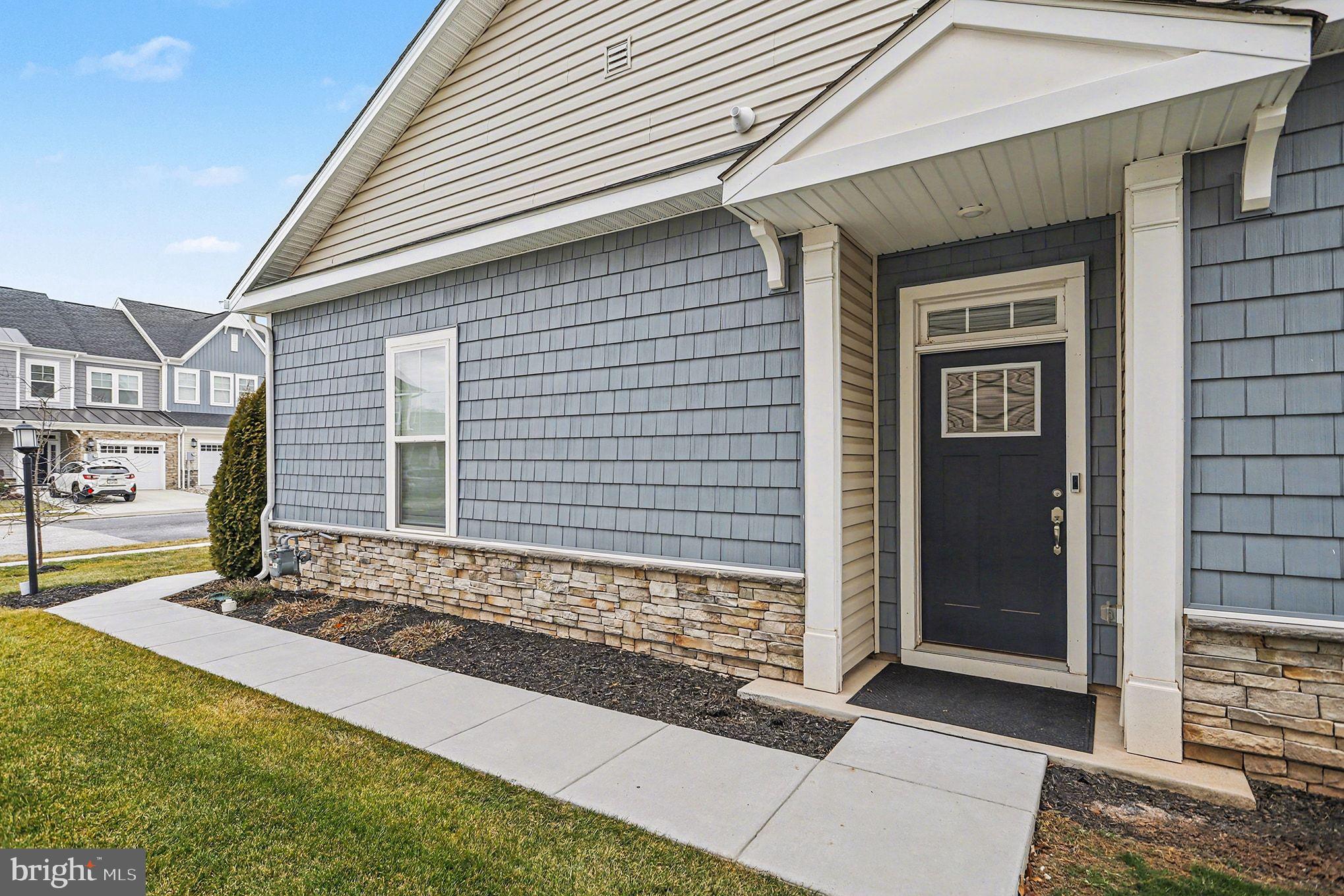 63 Rustic Wood Drive Gettysburg, PA 17325 - Photo 4 of 49 a front view of a house with a yard