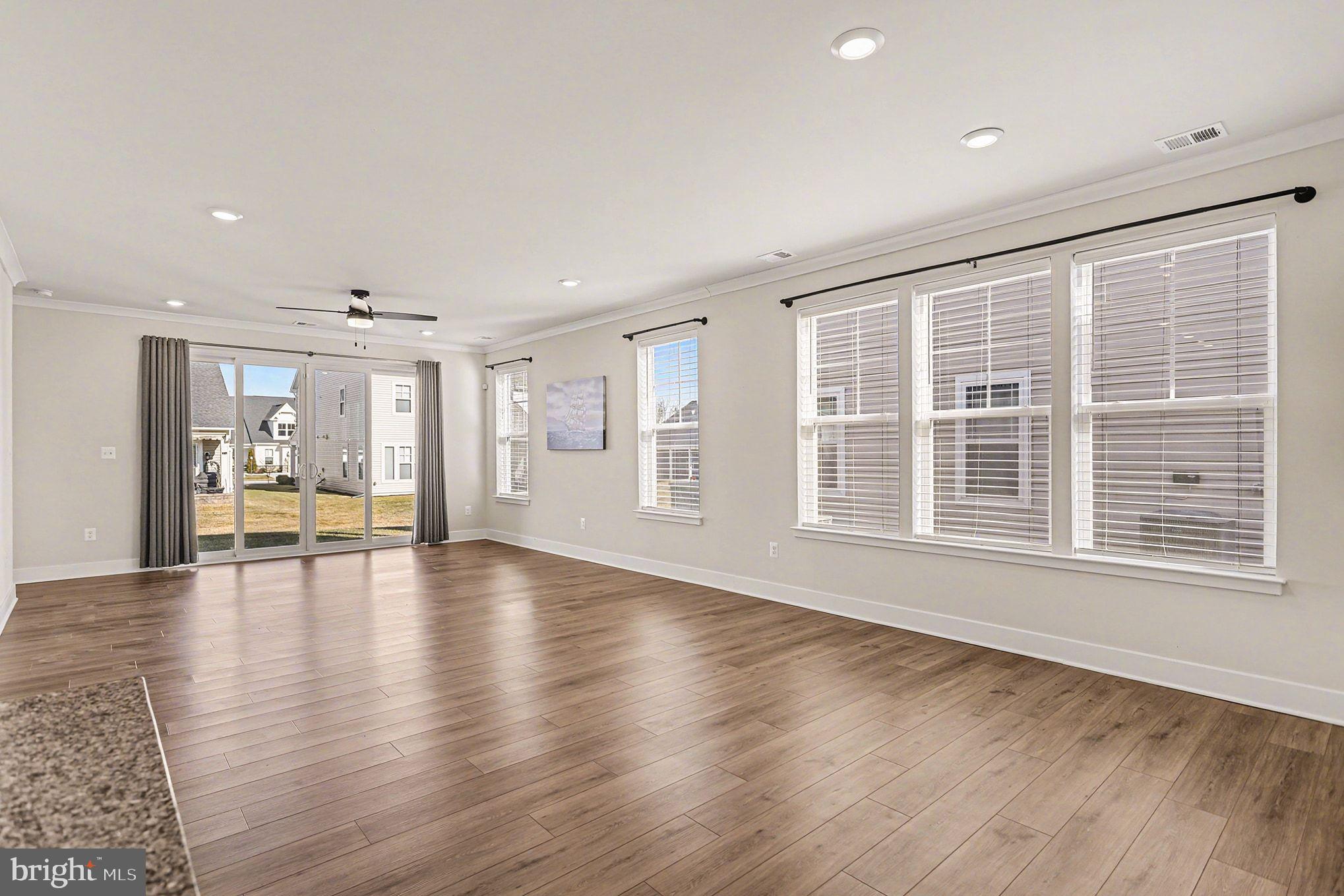 63 Rustic Wood Drive Gettysburg, PA 17325 - Photo 6 of 49 a view of an empty room with wooden floor and a window