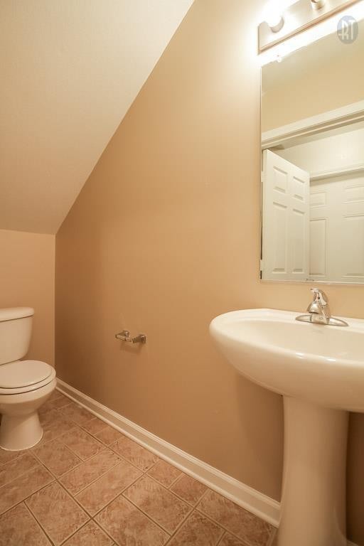 535 Lafayette Road, Unit I1 Clarksville, TN 37042 - Photo 12 of 24 a bathroom with a sink a toilet and a mirror