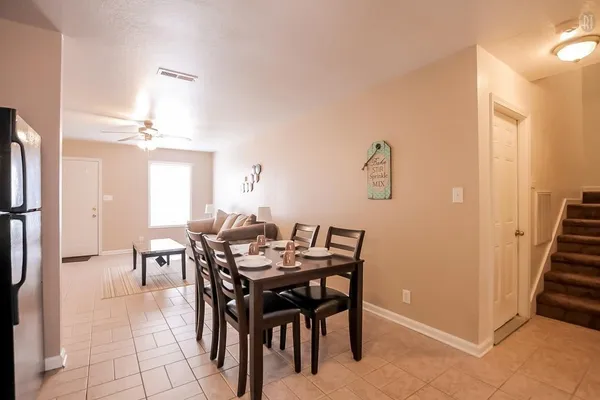 a view of a dining room with furniture