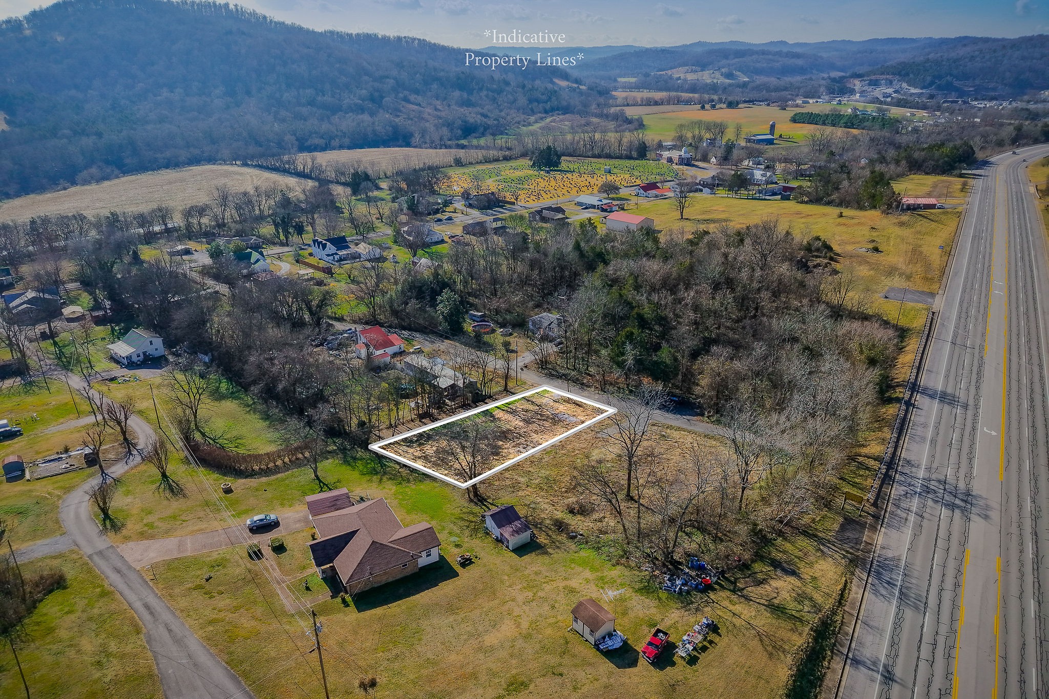 112 Stone Street Liberty, TN 37095 - Photo 14 of 14 an aerial view of a house with a yard