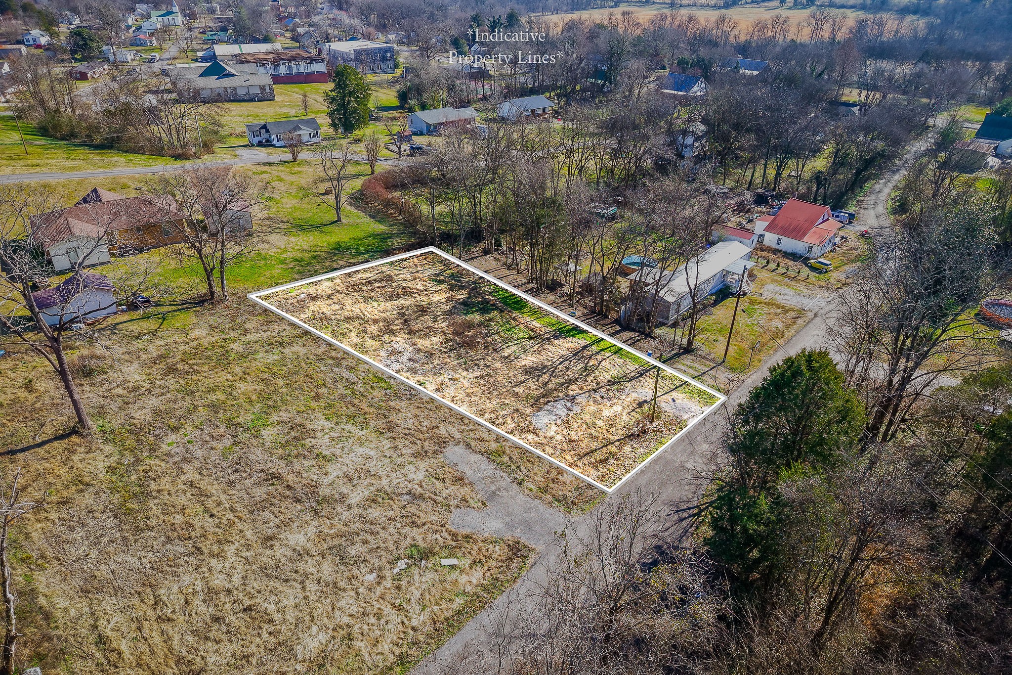 112 Stone Street Liberty, TN 37095 - Photo 3 of 14 a view of a backyard with wooden fence