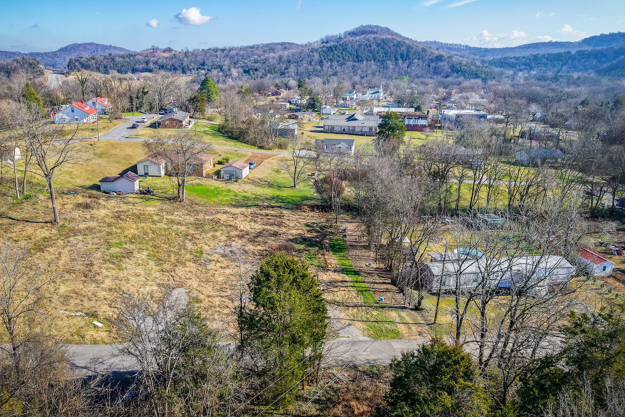 112 Stone Street Liberty, TN 37095 - Photo 7 of 14 a view of a lake with mountains in the back