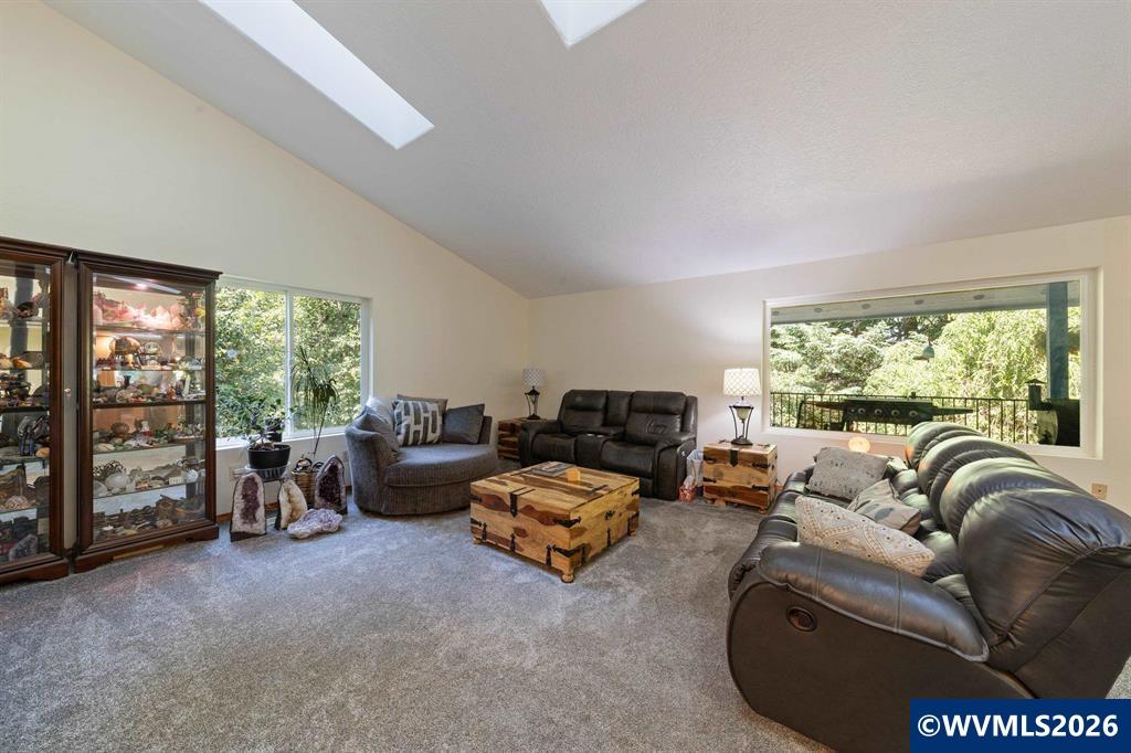 6100 Teal Creek Road Dallas, OR 97338 - Photo 5 of 41 a living room with furniture and a large window