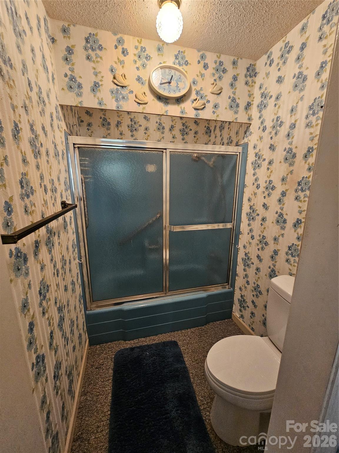 979 Suttle Road Lancaster, SC 29720 - Photo 24 of 26 a bathroom with a toilet and a shower