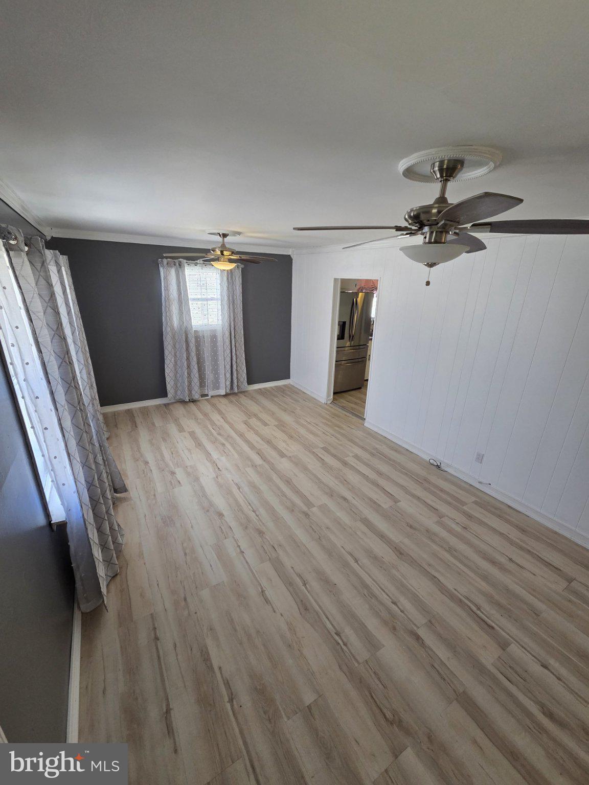 48 5th Avenue Maple Shade, NJ 08052 - Photo 15 of 31 a view of a livingroom with a ceiling fan and window