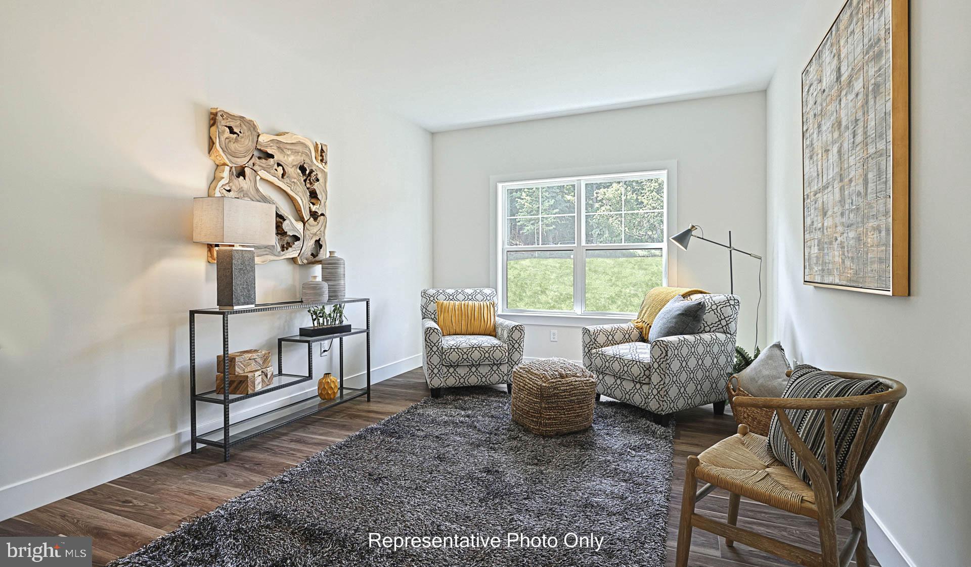316 Goshawks Road Denver, PA 17517 - Photo 24 of 28 a living room with furniture and a window