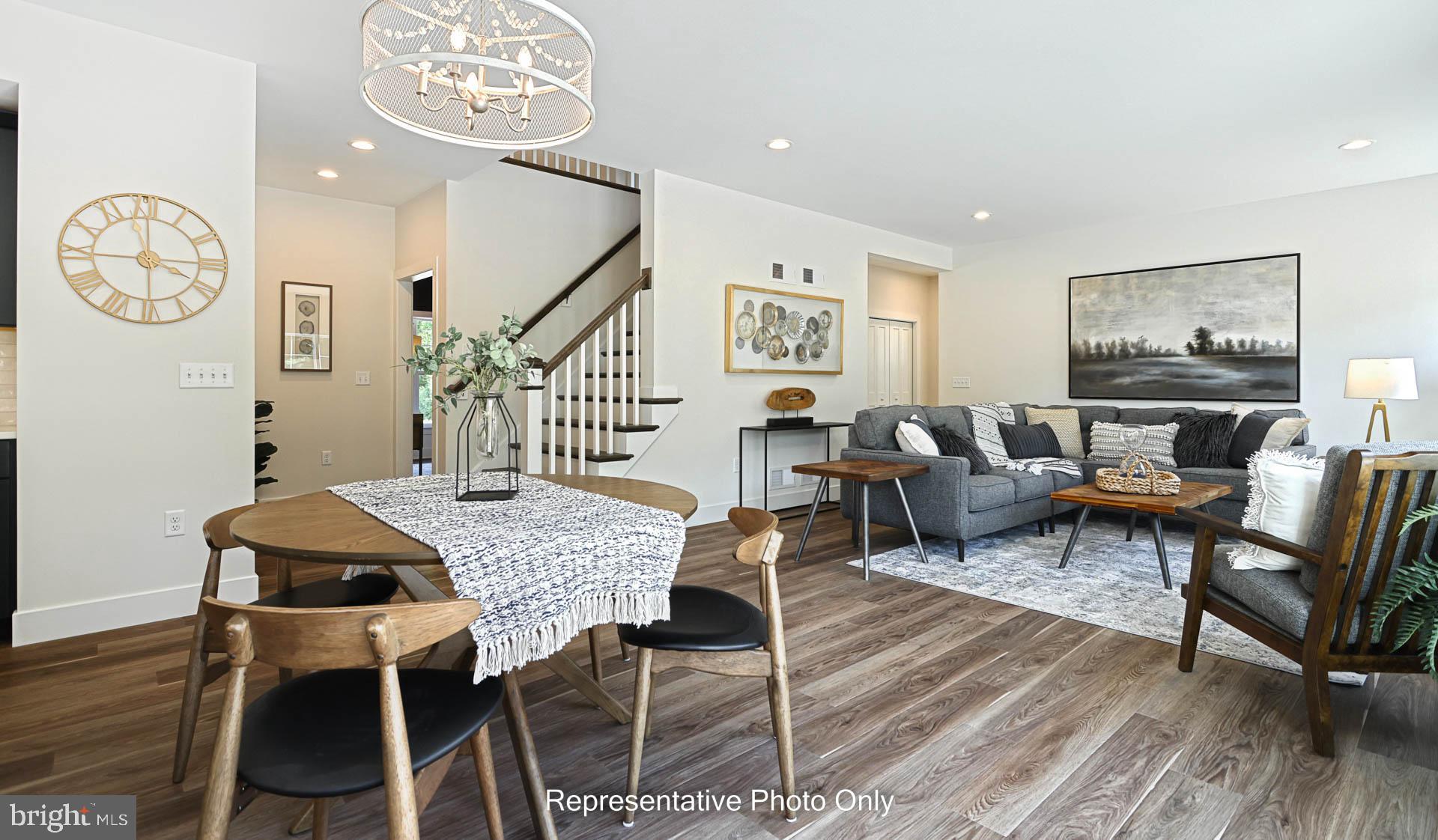 316 Goshawks Road Denver, PA 17517 - Photo 5 of 28 a view of a dining room with furniture and wooden floor