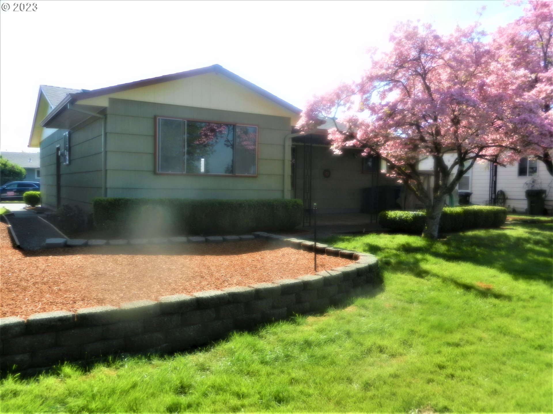 1661 Princeton Road Woodburn, OR 97071 - Photo 3 of 28 a front view of a house with a yard