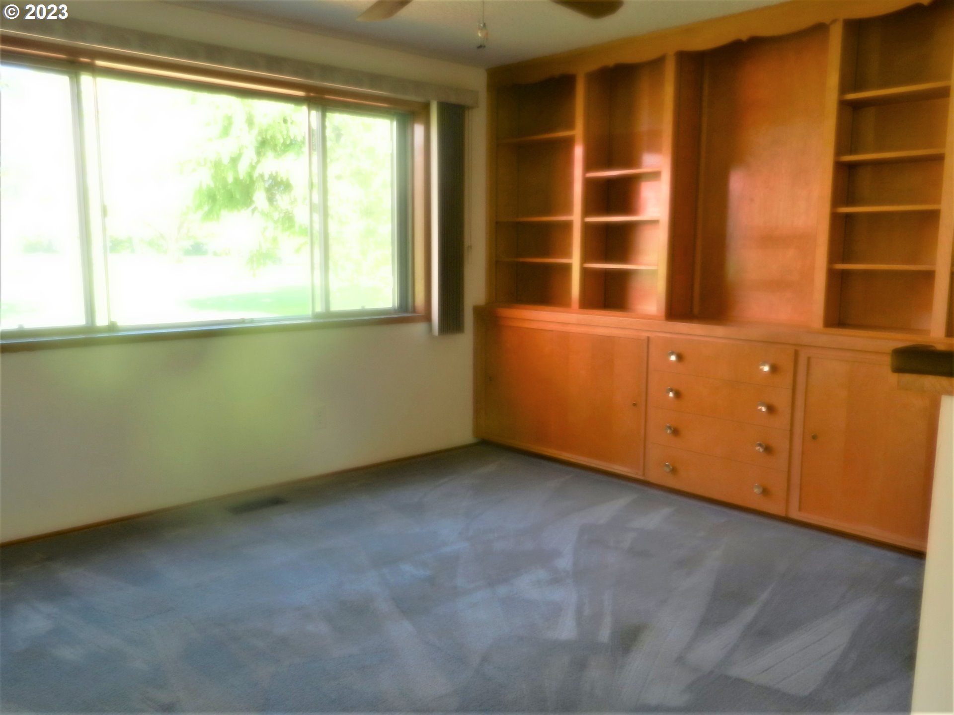 1661 Princeton Road Woodburn, OR 97071 - Photo 10 of 28 a view of an empty room with a window