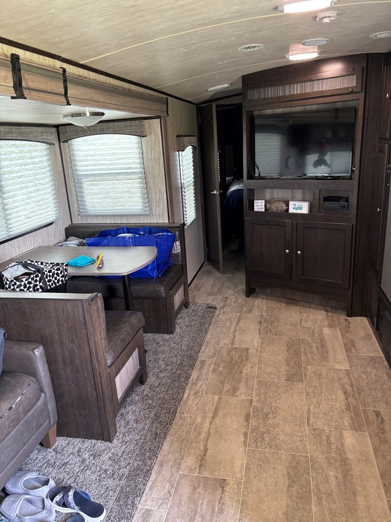 114 Red Snapper Drive Port Lavaca, TX 77979 - Photo 31 of 44 a living room with a couch and a flat screen tv