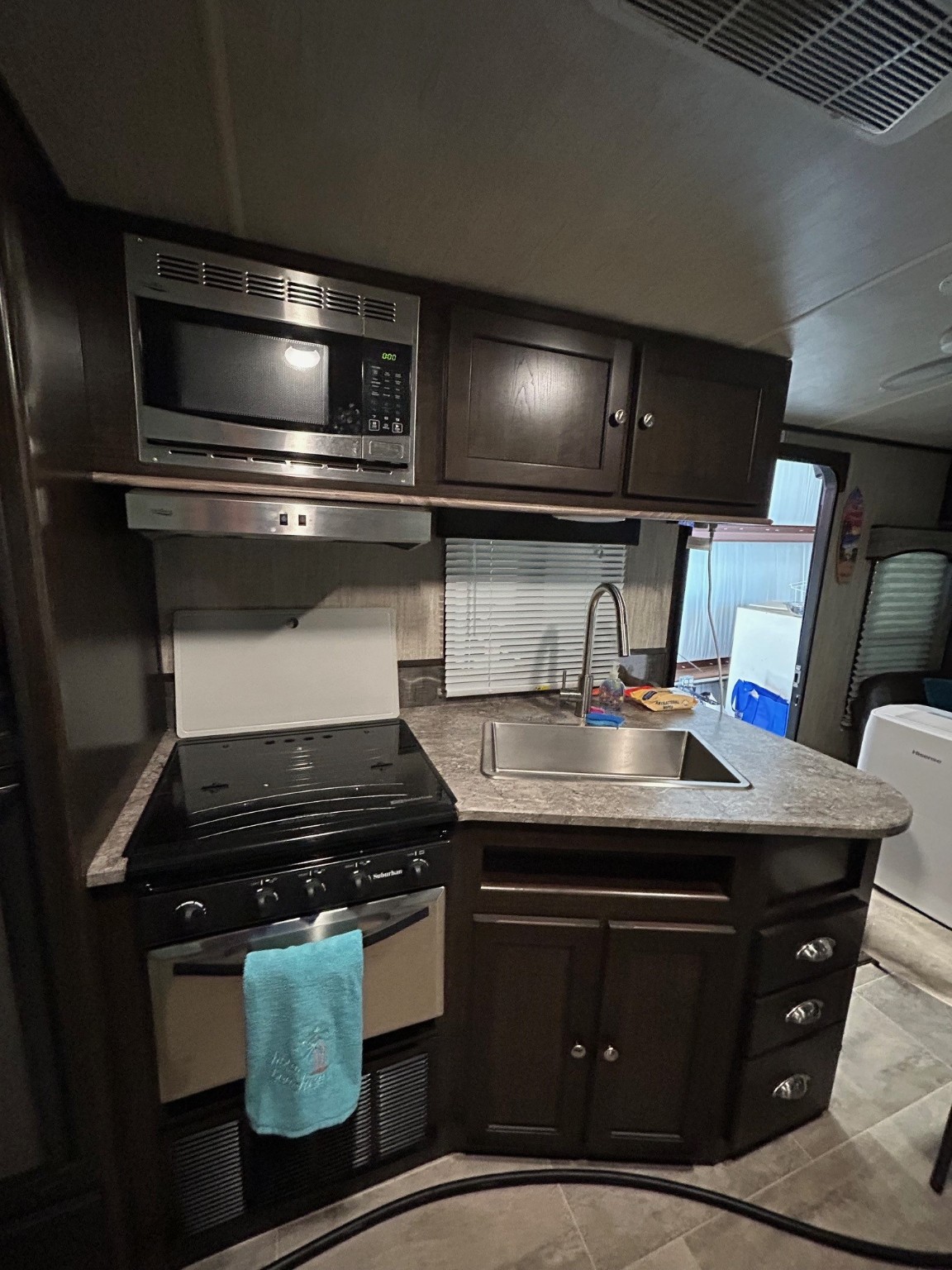 114 Red Snapper Drive Port Lavaca, TX 77979 - Photo 32 of 44 a kitchen with a stove and a microwave