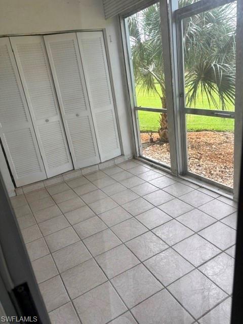 5651 Rattlesnake Hammock Road, Unit C108 Naples, FL 34113 - Photo 10 of 14 a view of a room & utility room and window