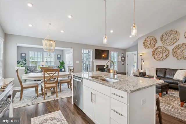 a kitchen with a table and chairs in it