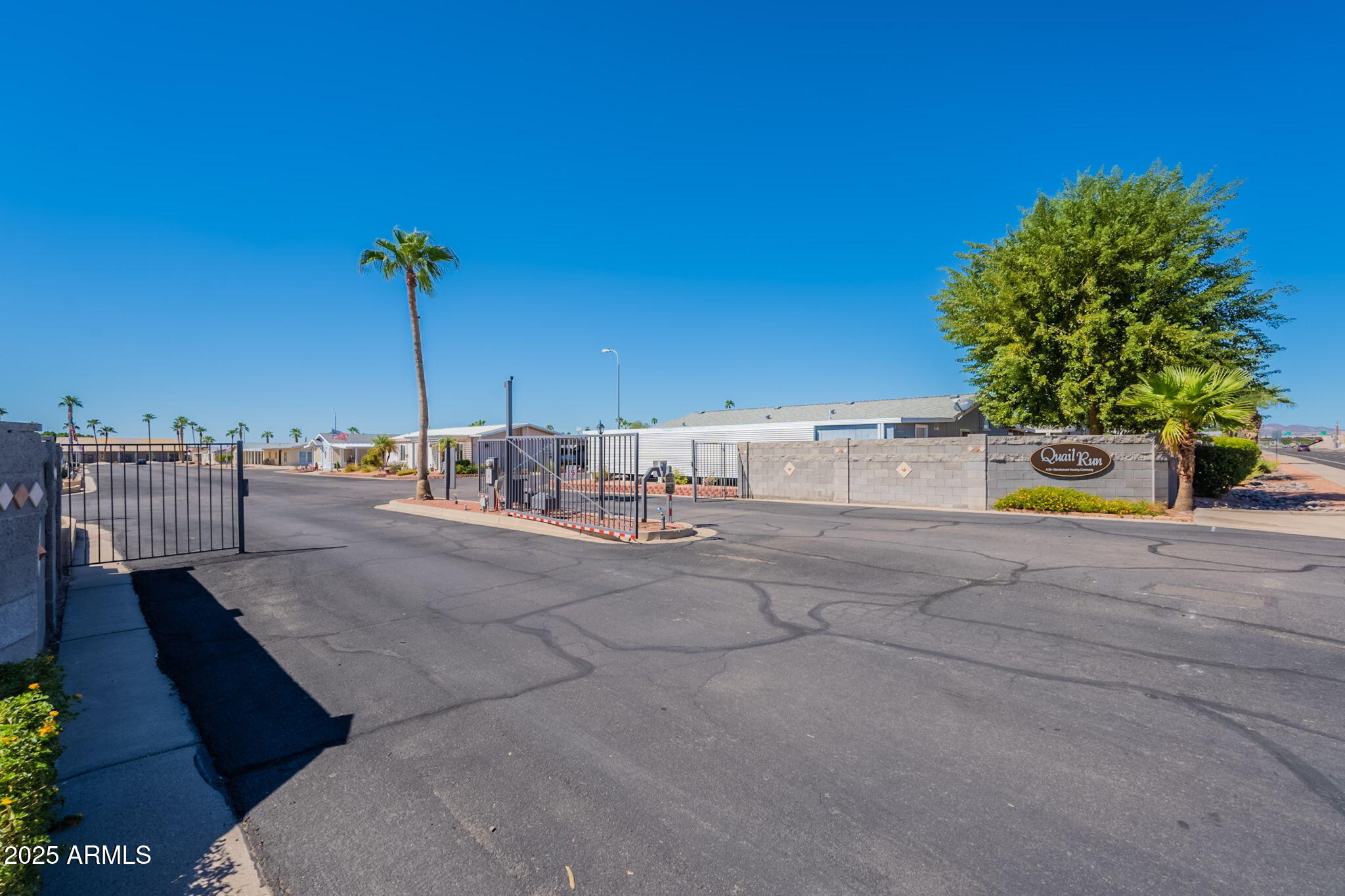 3700 South Tomahawk Road, Unit 39 Apache Junction, AZ 85119 - Photo 43 of 53 a view of a outdoor space and a street view