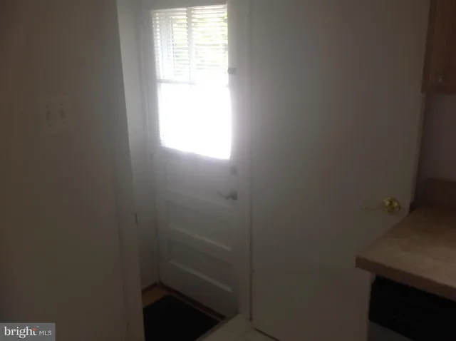 a empty room with windows