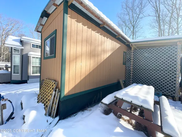 a balcony with wooden floor