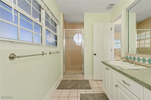 a view of balcony with wooden floor and fence