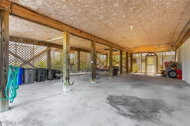 a view of house with deck outdoor seating and city view