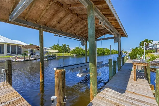 an aerial view of a house with swimming pool