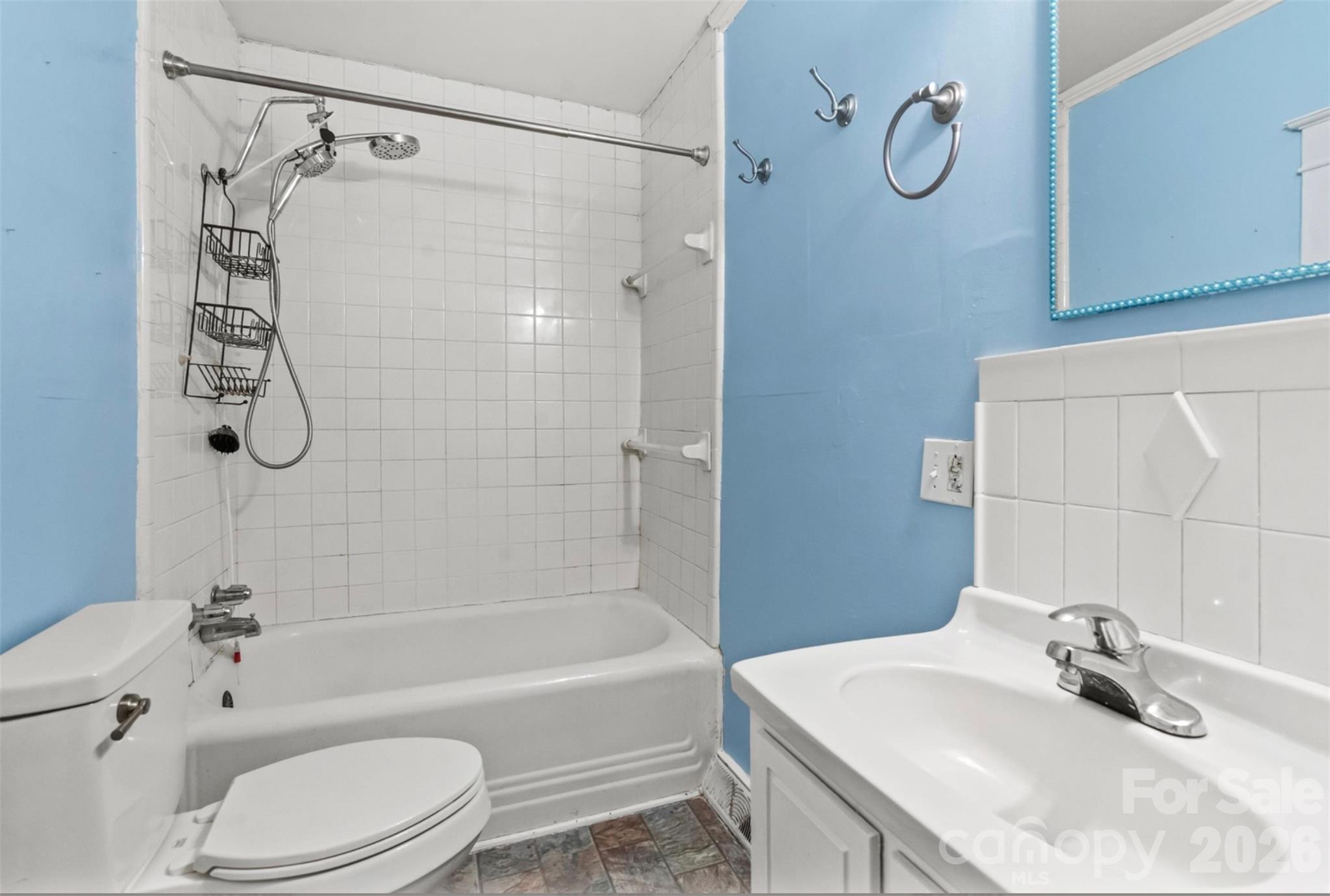 1409 Venus Street Kannapolis, NC 28083 - Photo 13 of 22 a bathroom with a sink toilet and shower