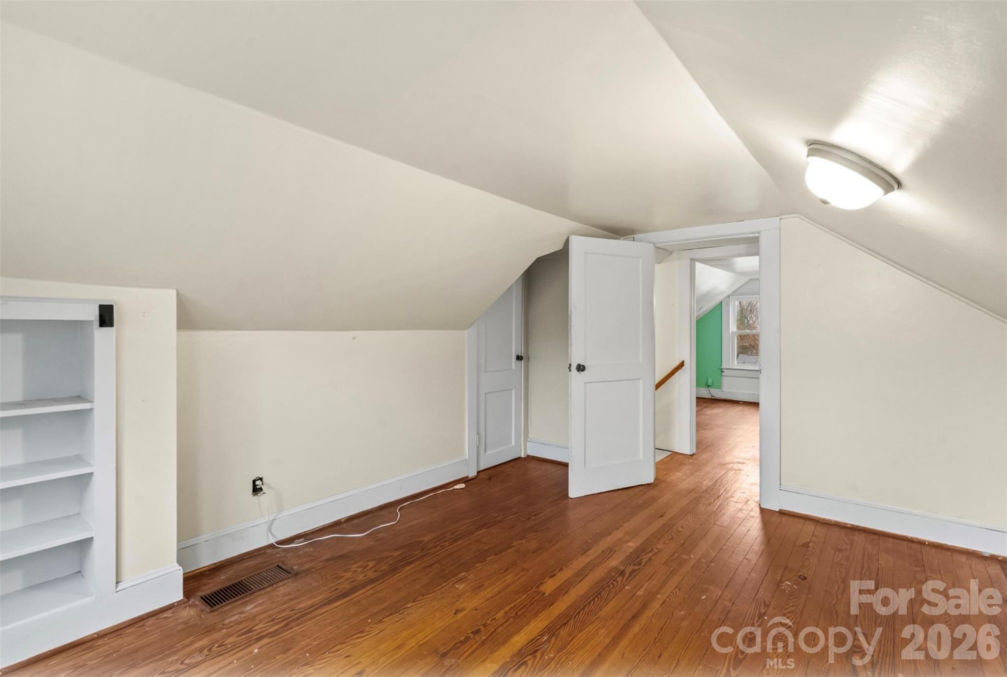 1409 Venus Street Kannapolis, NC 28083 - Photo 16 of 22 a view of empty room with wooden floor