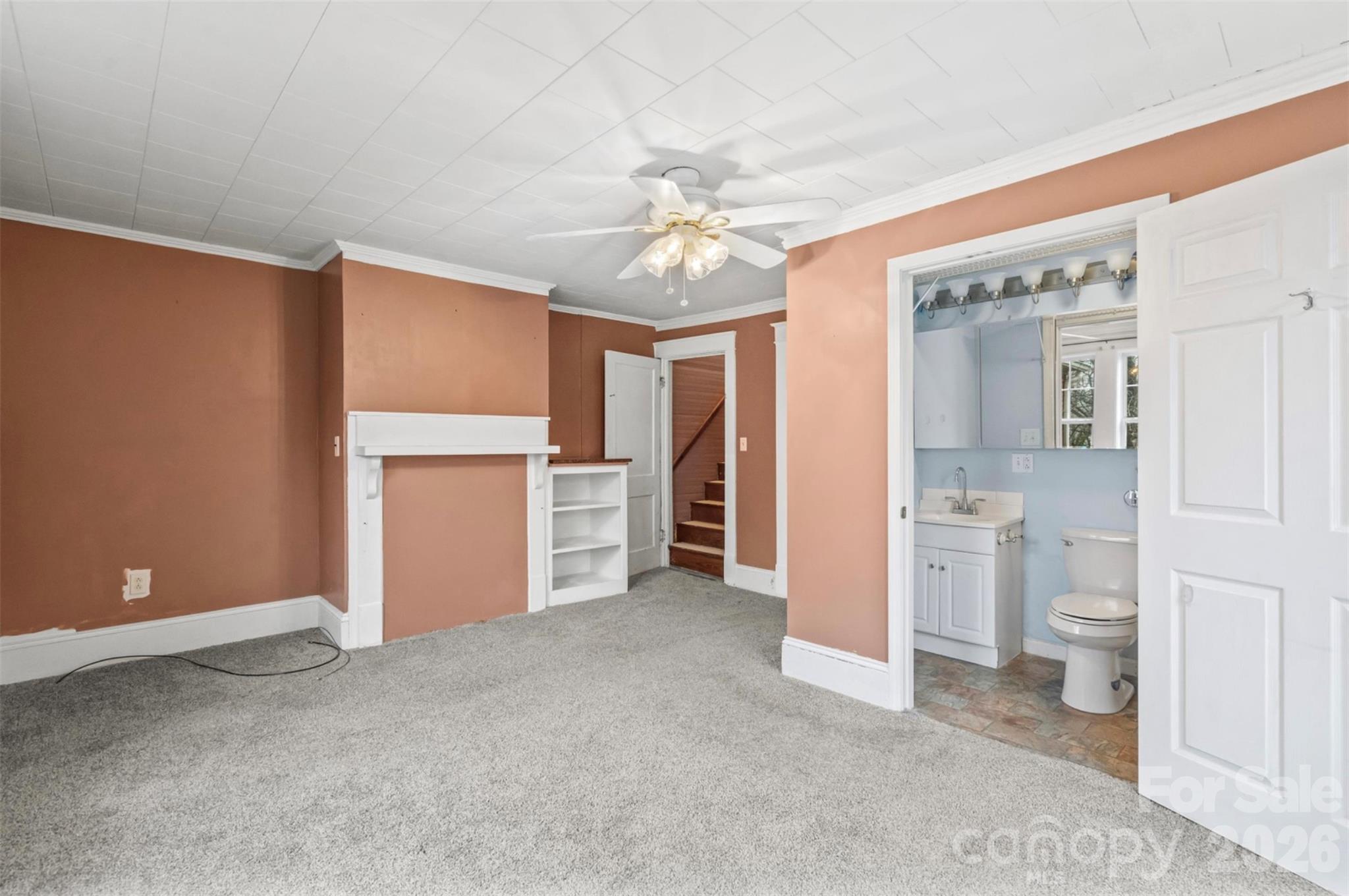 1409 Venus Street Kannapolis, NC 28083 - Photo 9 of 22 a view of a kitchen with refrigerator and cabinet