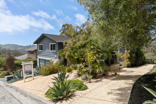 1159 Barcelona Drive Pacifica, CA 94044 - Photo 3 of 67 a view of a house with a yard