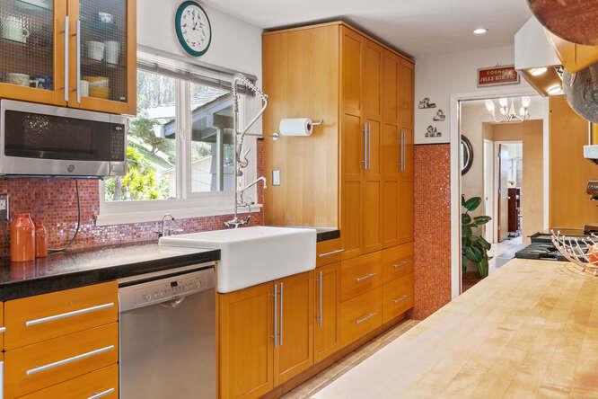 1159 Barcelona Drive Pacifica, CA 94044 - Photo 22 of 67 a kitchen with stainless steel appliances a sink a stove a refrigerator and a sink