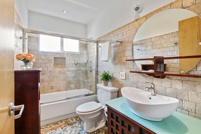 1159 Barcelona Drive Pacifica, CA 94044 - Photo 26 of 67 a bathroom with a sink a toilet and a bathtub