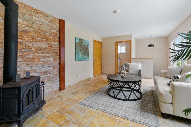 1159 Barcelona Drive Pacifica, CA 94044 - Photo 34 of 67 a living room with furniture a rug and a window