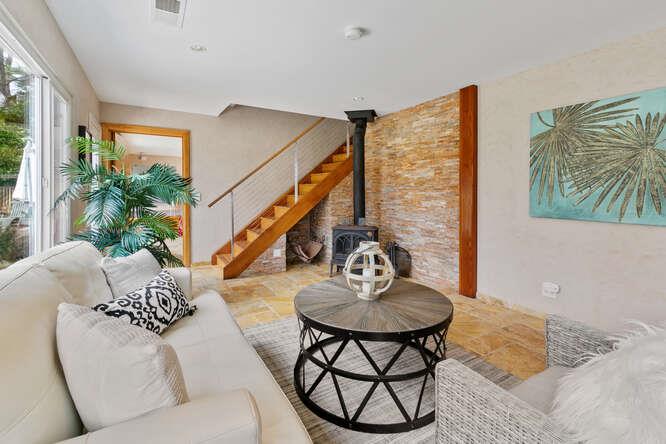1159 Barcelona Drive Pacifica, CA 94044 - Photo 36 of 67 a living room with furniture and a potted plant