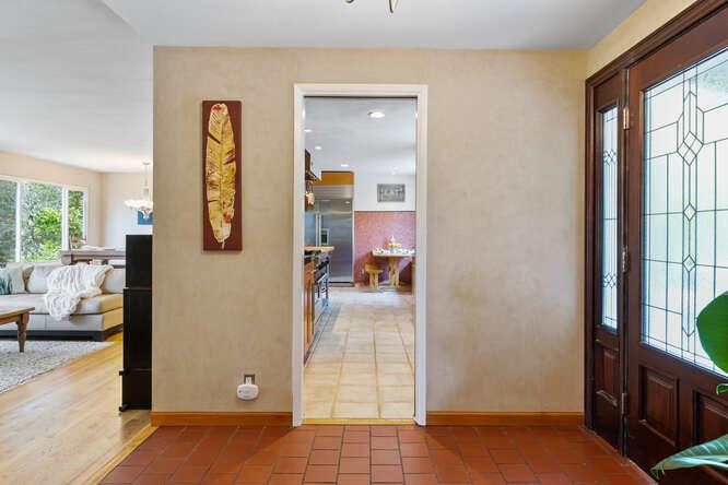 1159 Barcelona Drive Pacifica, CA 94044 - Photo 6 of 67 a view of a hallway with a livingroom and a window