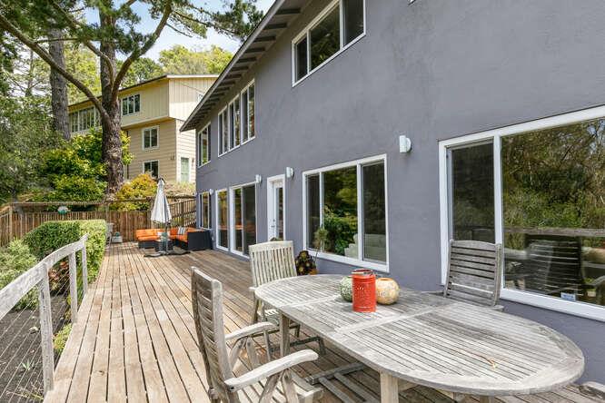 1159 Barcelona Drive Pacifica, CA 94044 - Photo 55 of 67 a view of a roof deck with couches chairs and wooden floor