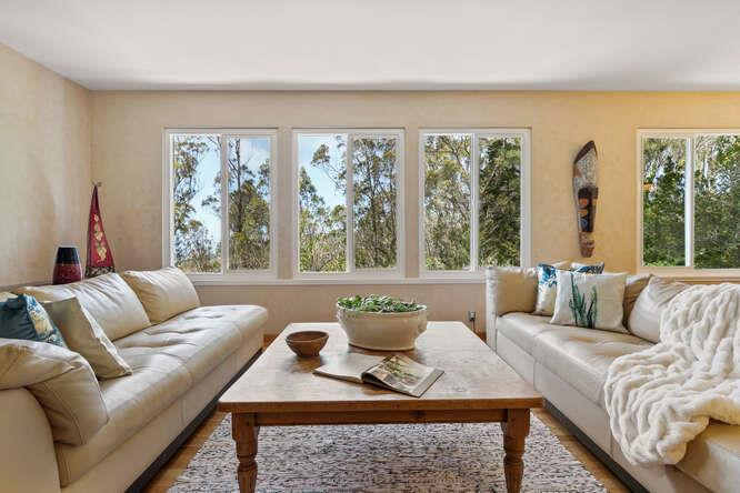 1159 Barcelona Drive Pacifica, CA 94044 - Photo 8 of 67 a living room with furniture and a large window