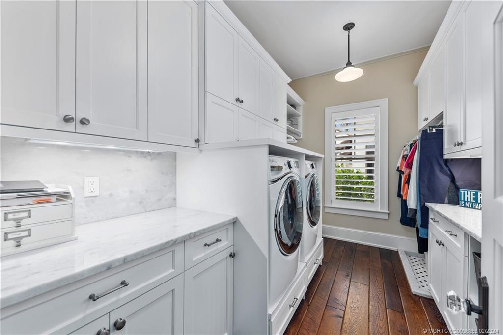 1441 Southeast Riverside Drive Stuart, FL 34996 - Photo 28 of 73 a view of a kitchen with washer and dryer