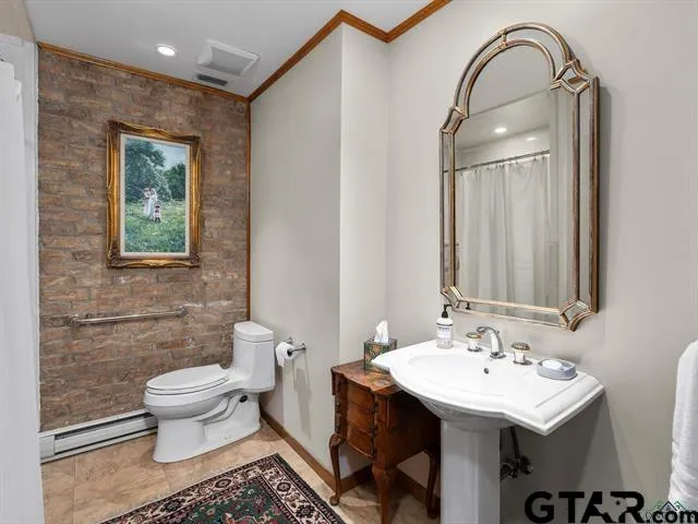 a bathroom with a sink and a toilet
