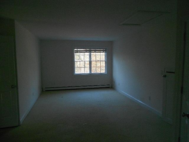 255 Little River Road Cotuit, MA 02635 - Photo 6 of 10 a view of empty room with window
