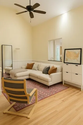 a living room with a couch and a flat screen tv