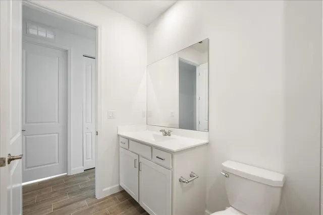 a bathroom with a shower and a toilet