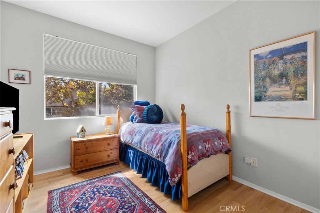 17823 Poplar Court Carson, CA 90746 - Photo 17 of 30 a bedroom with two beds and a window